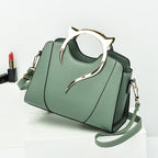 Sloane shell crossbody bag in sage