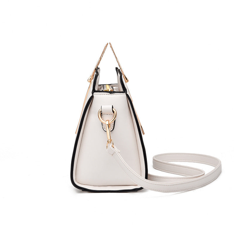 Sloane shell crossbody bag in cream, front view