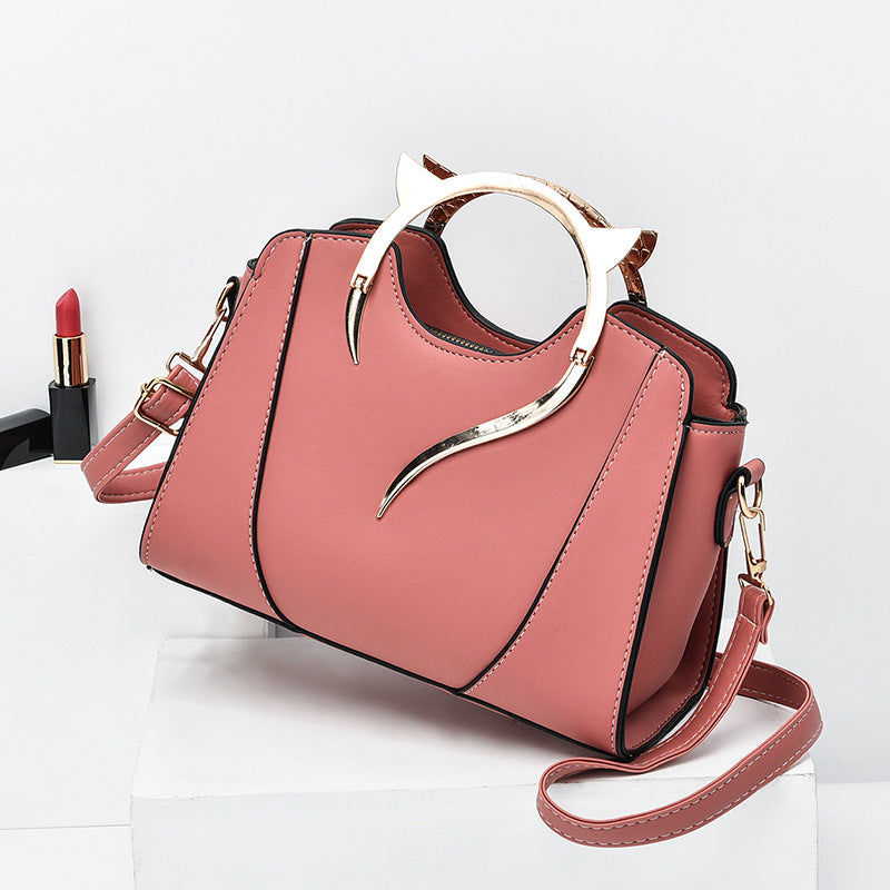 Sloane shell crossbody bag in rose