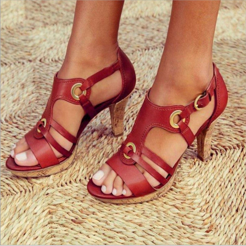 Imogen T bar heeled sandals in red, worn