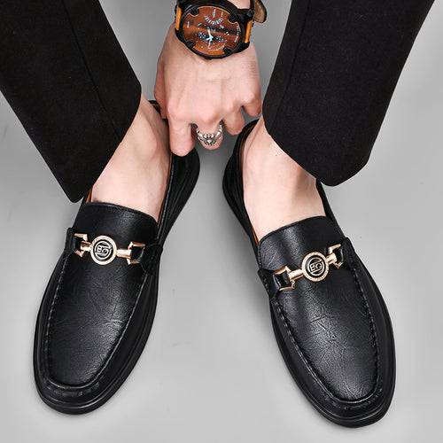 Archer bit driving loafers in black, worn