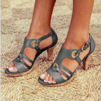 Imogen T bar heeled sandals in grey, worn