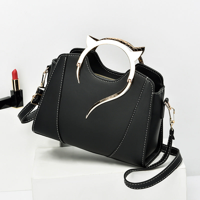 Sloane shell crossbody bag in black