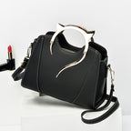 Sloane shell crossbody bag in black