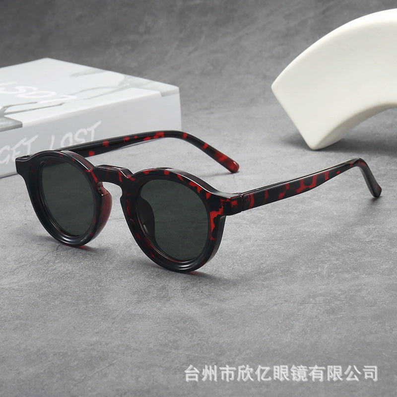 Iris | Womens Tortoiseshell Polarised Round Retro Sunglasses - Red Tortoiseshell / Green Lens